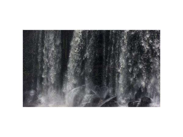 Man in the waterfall